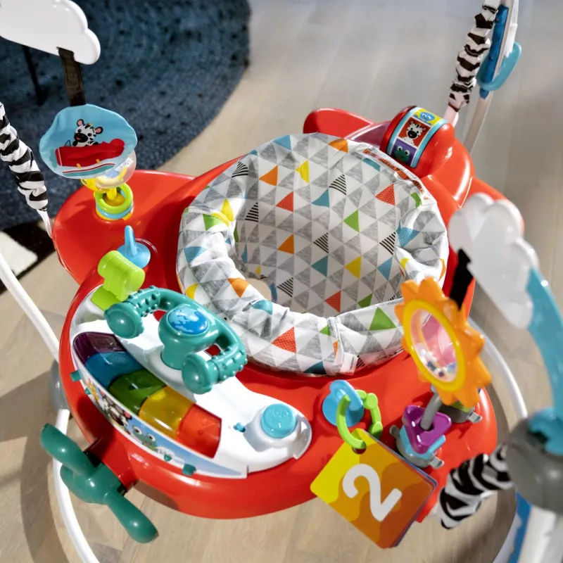 BABY EINSTEIN Skákadlo/aktivní centrum 2v1 Ocean Explorers Airplane Adventure™ 6m+ do 12 kg