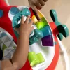BABY EINSTEIN Skákadlo/aktivní centrum 2v1 Ocean Explorers Airplane Adventure™ 6m+ do 12 kg