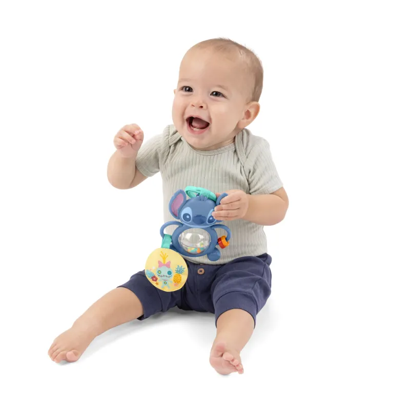 BRIGHT STARTS Hračka na C kroužku senzorická Stitch Tummy Tumble™ 0m+