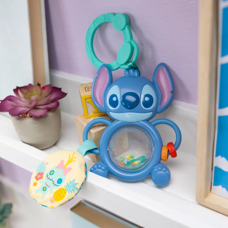 BRIGHT STARTS Hračka na C kroužku senzorická Stitch Tummy Tumble™ 0m+