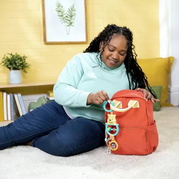 BRIGHT STARTS Hračka na C kroužku aktivní Winnie the Pooh Busy Bear™ 0m+