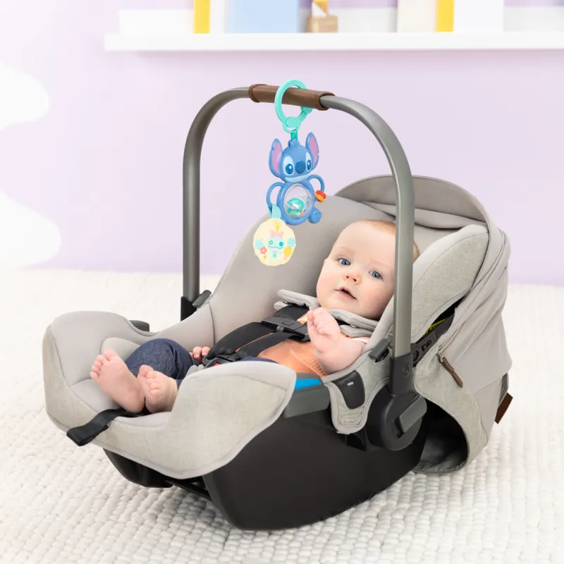 BRIGHT STARTS Hračka na C kroužku senzorická Stitch Tummy Tumble™ 0m+
