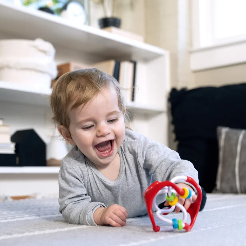 BABY EINSTEIN Hračka míček senzorický Slide & Swirl™ 0m+