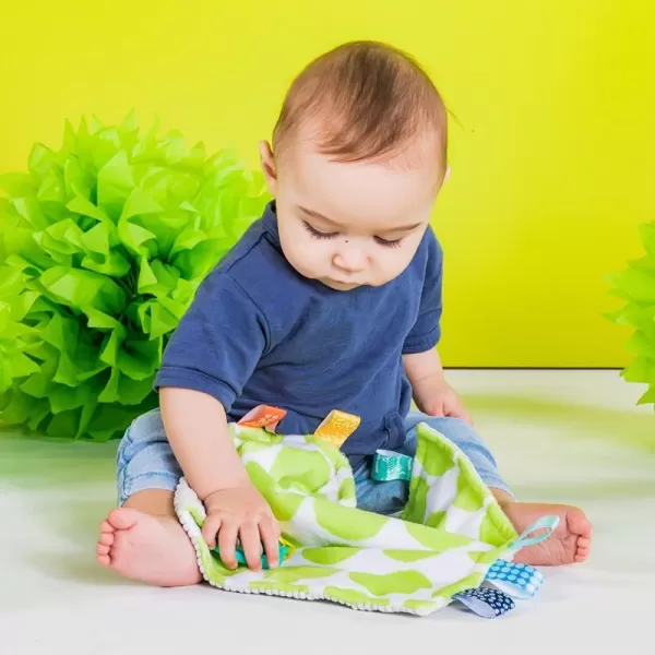 BRIGHT STARTS Mazlící dečka na C kroužku Little Taggies zelené tečky 0 m+