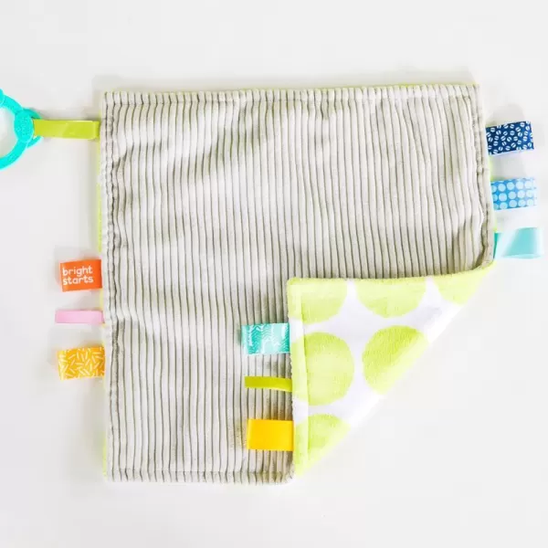 BRIGHT STARTS Mazlící dečka na C kroužku Little Taggies zelené tečky 0 m+