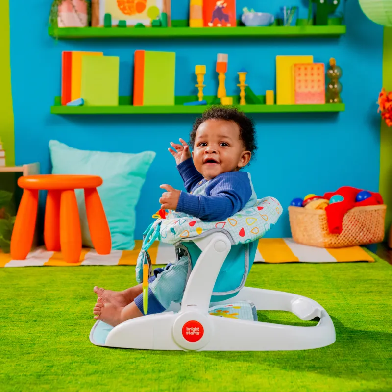 BRIGHT STARTS Křesílko učicí s hračkami připravené na cestování Learn-to-Sit™, 4m+