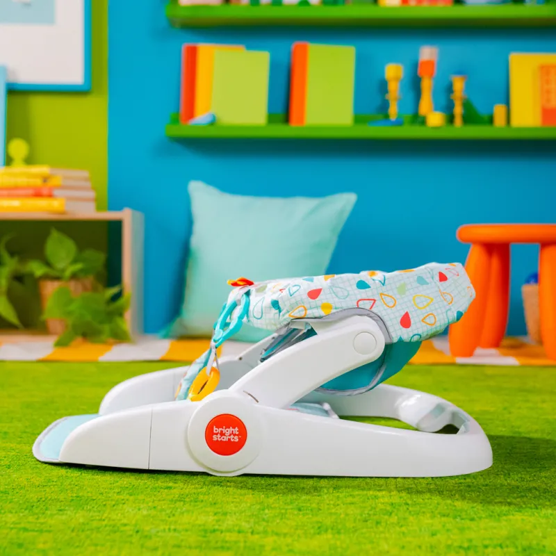 BRIGHT STARTS Křesílko učicí s hračkami připravené na cestování Learn-to-Sit™, 4m+